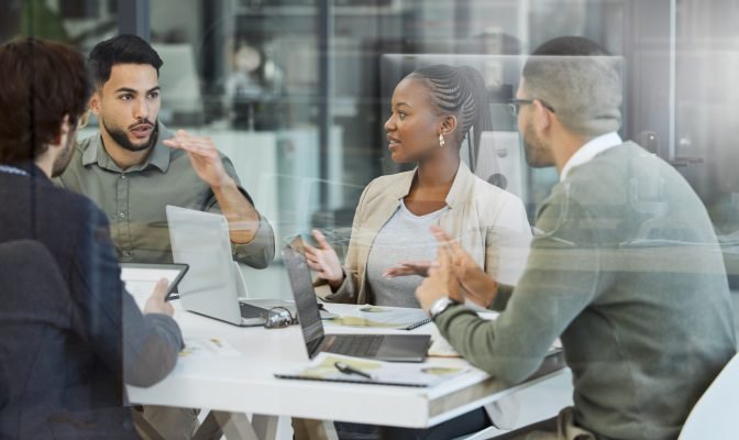 Meeting, collaboration and business people in discussion in the office while working together. Teamwork, planning and group of employees brainstorming with technology for a project in the workplace. Meeting, collaboration and business people in discussion in the office while working together. Teamwork, planning and group of employees brainstorming with technology for a project in the workplace